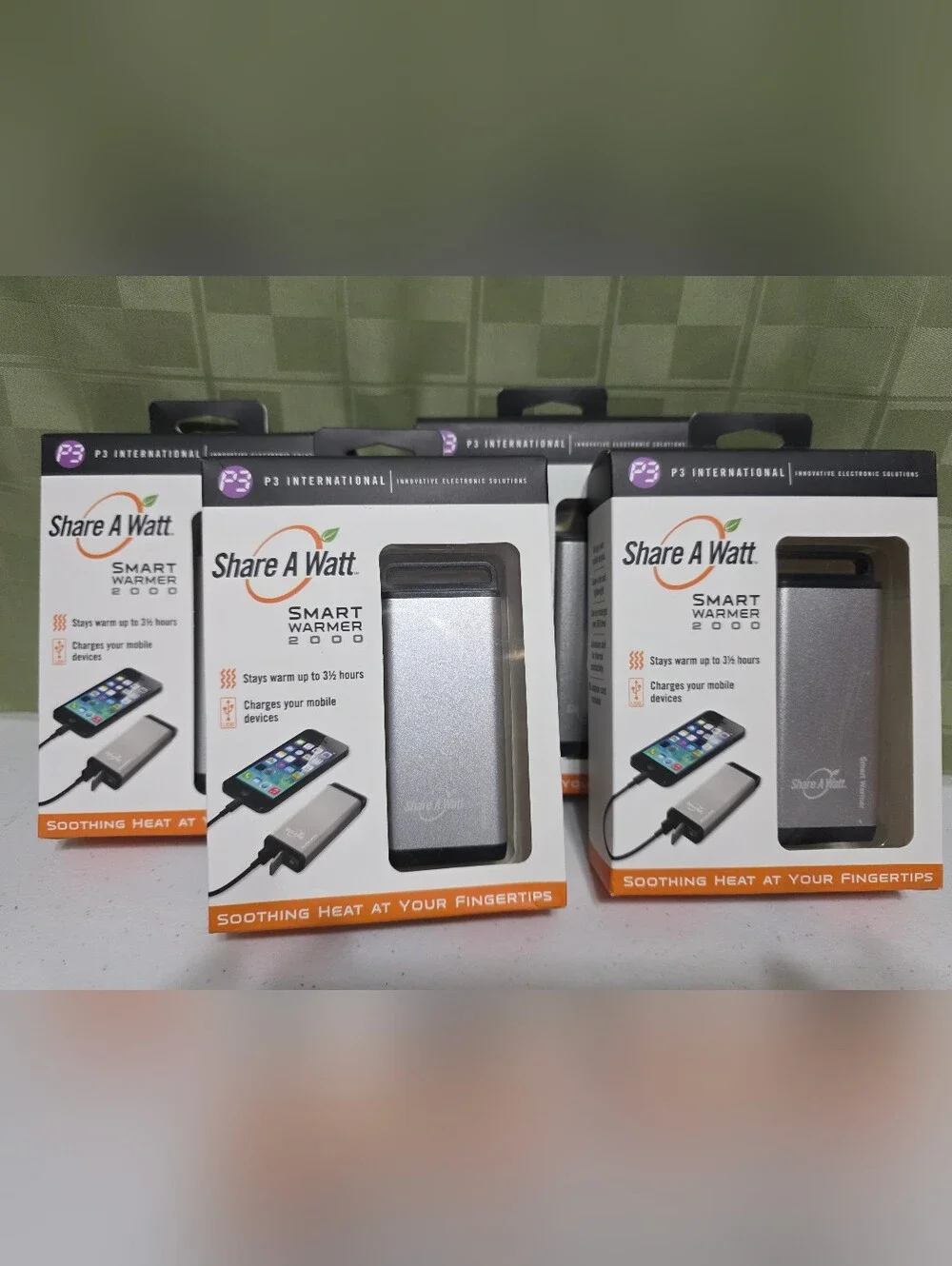 Smart Warmer 2000 Portable Hand Warmer and Charger - Silver. Family Pack Of Four